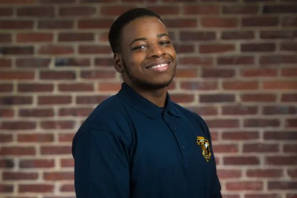 Maximus Carter, a young Black man