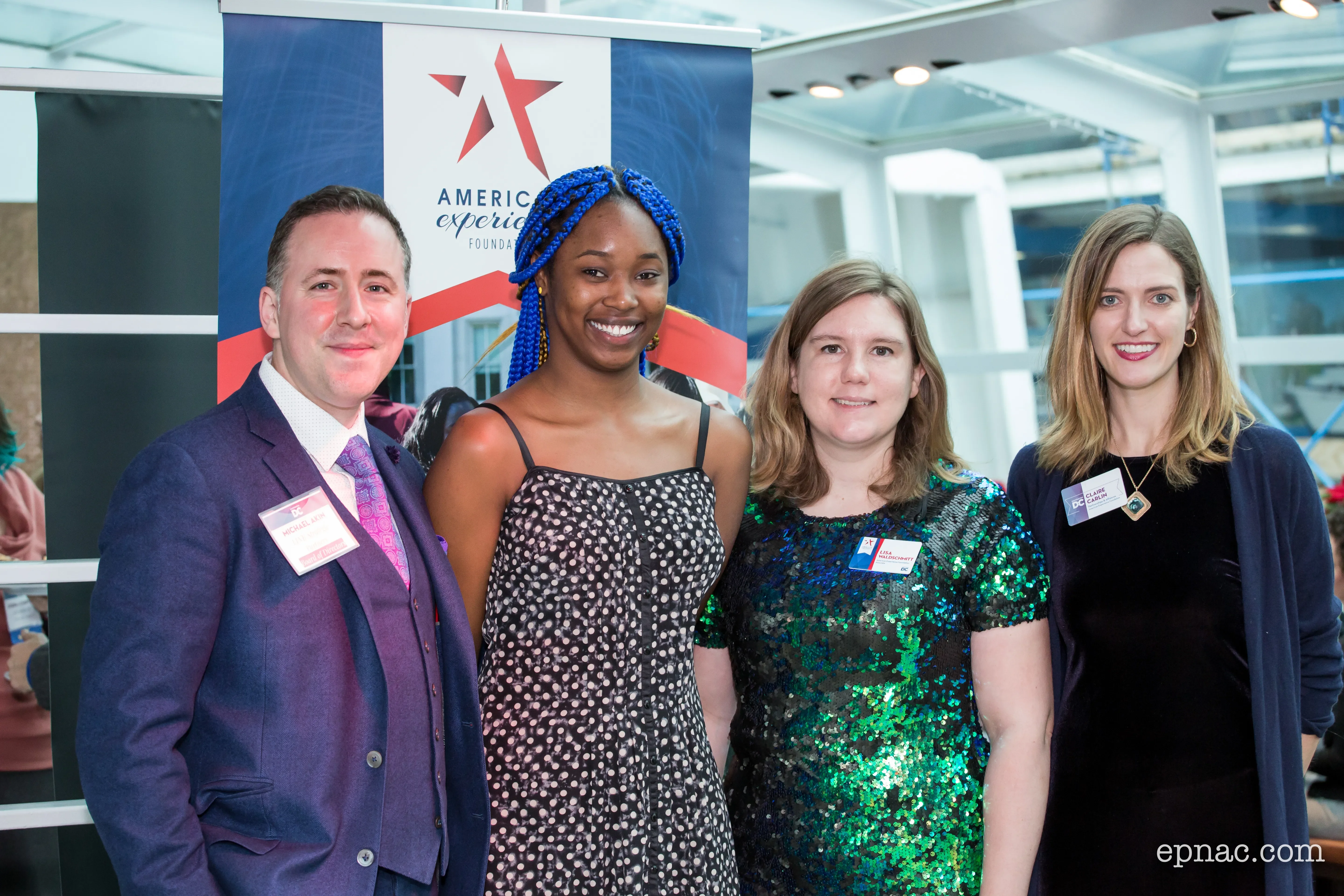 2017 CRI intern Deranique Graydon stands with the AEF team at the annual Holiday Celebration